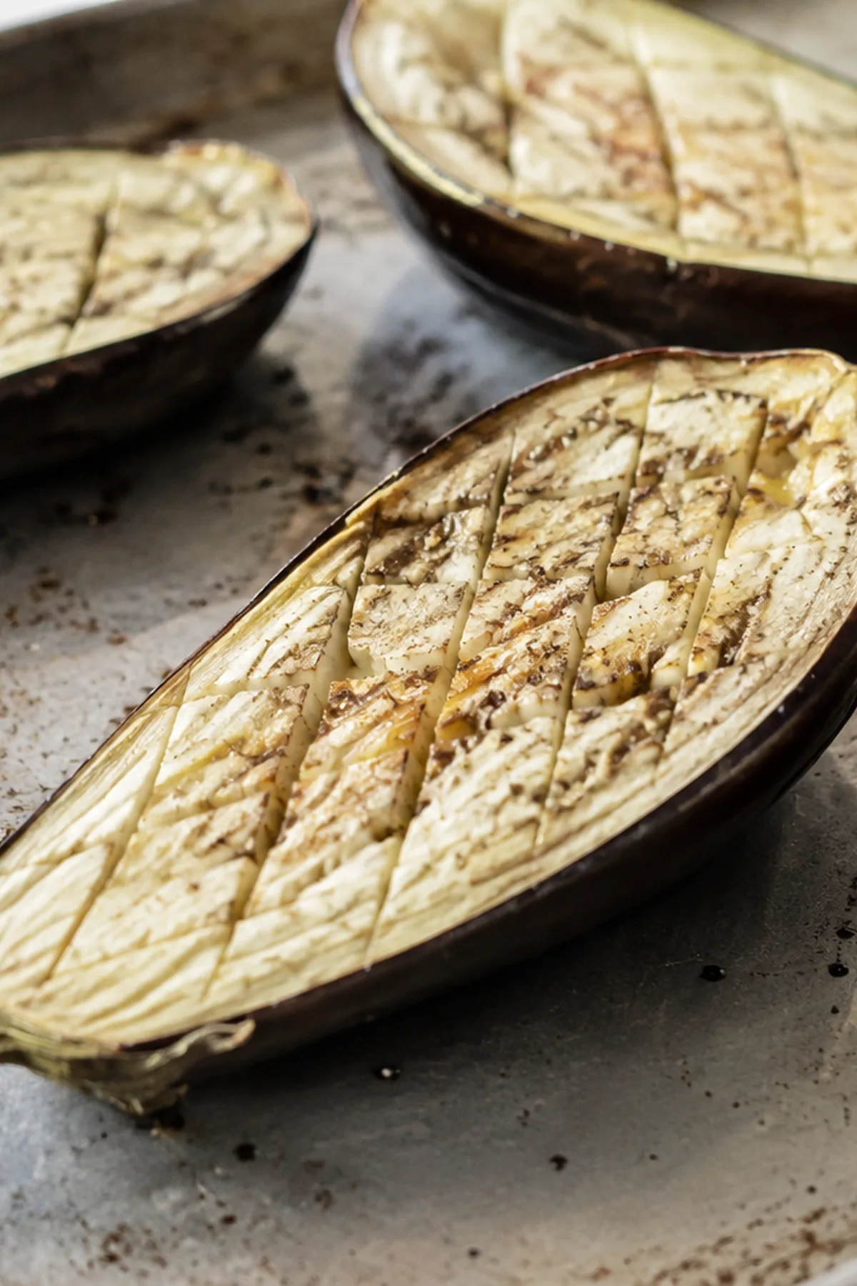 Préparation de Aubergines farcies au boulgour, tomates et feta